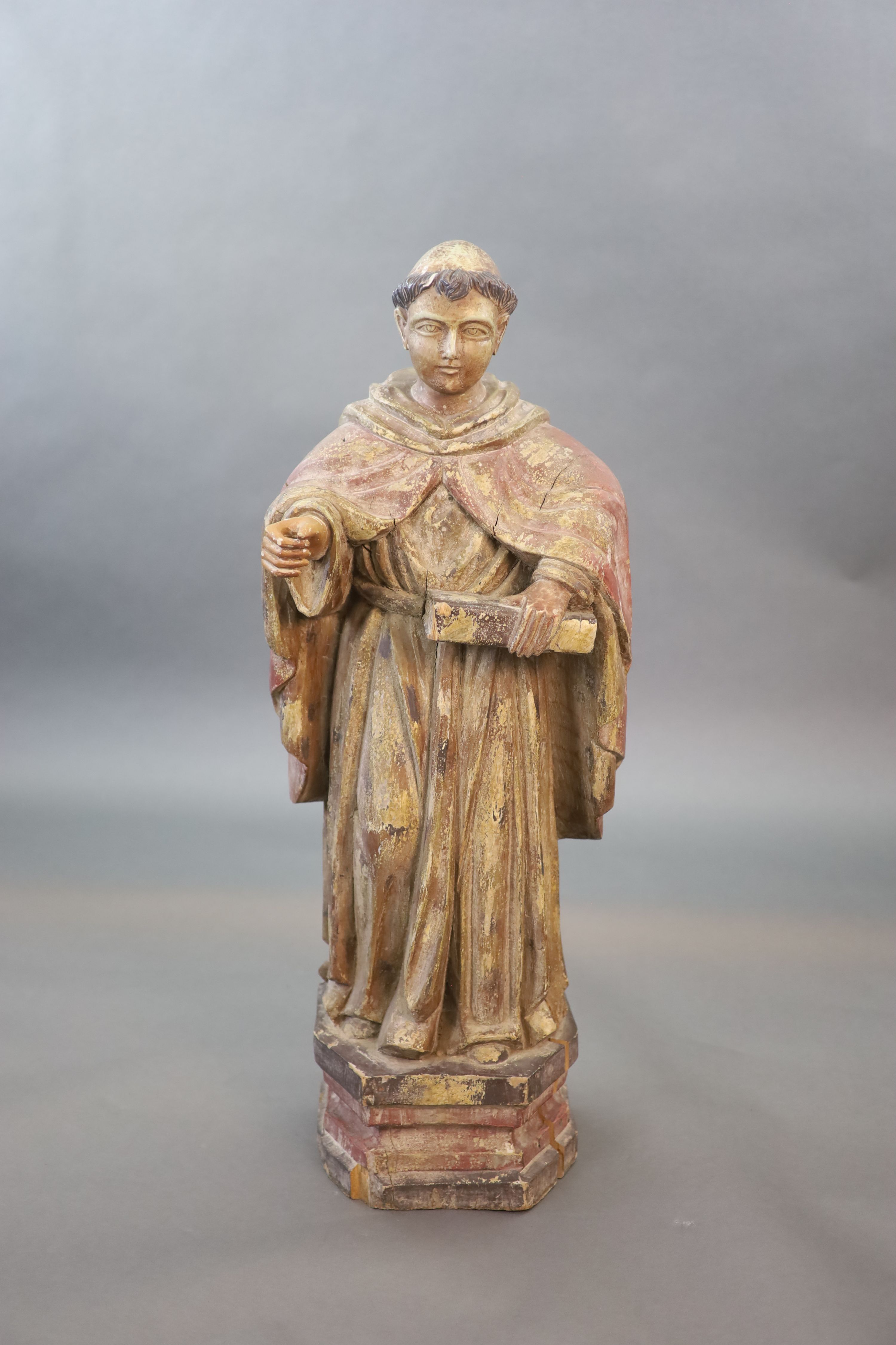 A large carved hardwood study of a standing monk or Saint, early 20th century 102cm high